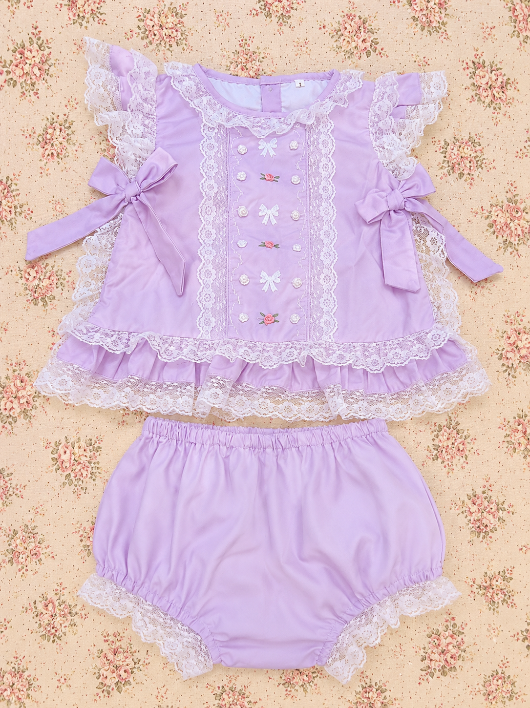 Lavender lullaby Top and bloomer set.  *These run a size small so please Size up *